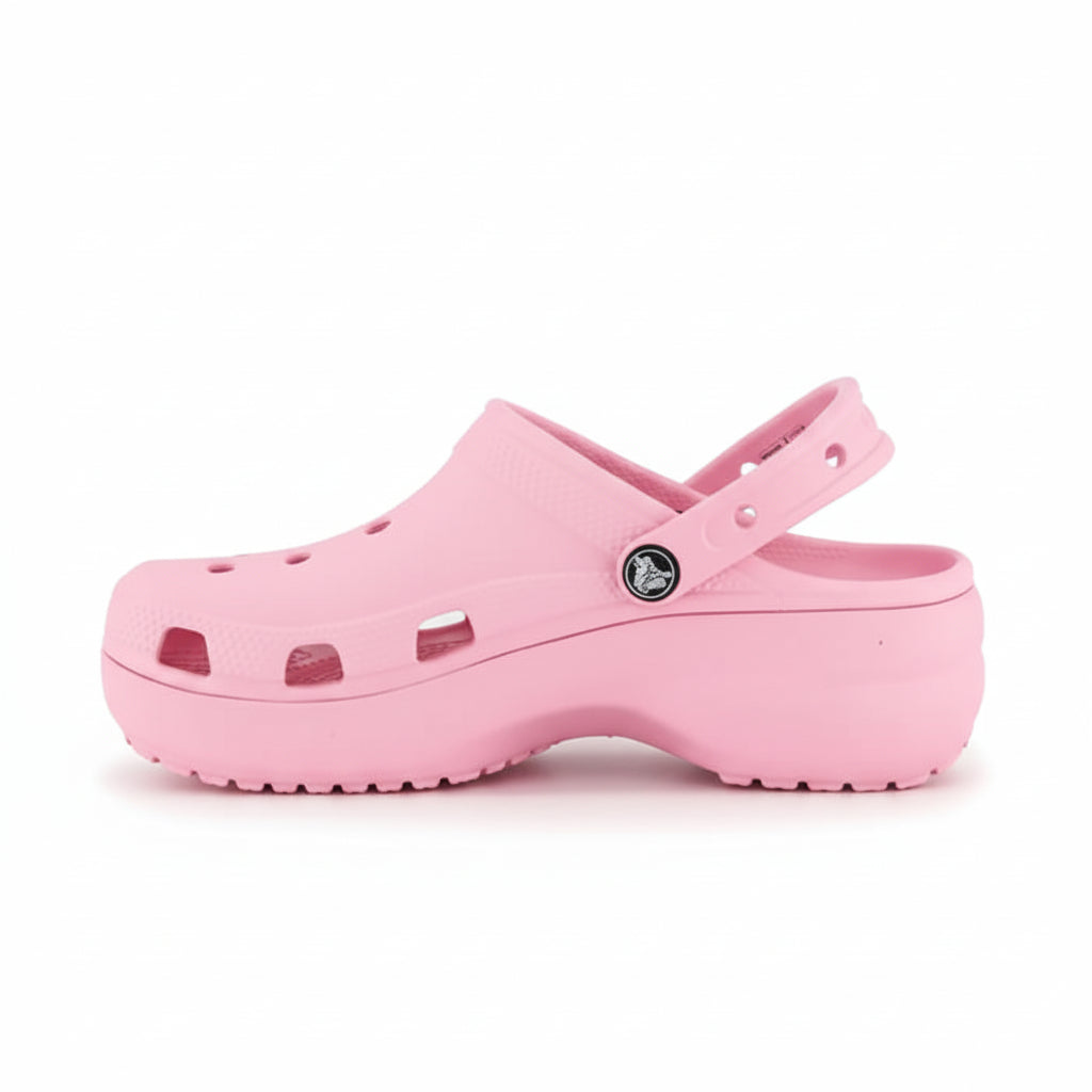 Pink clog shoe on a white background