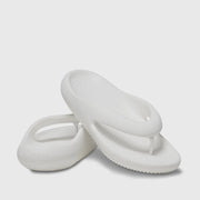 White sandals on a light gray background