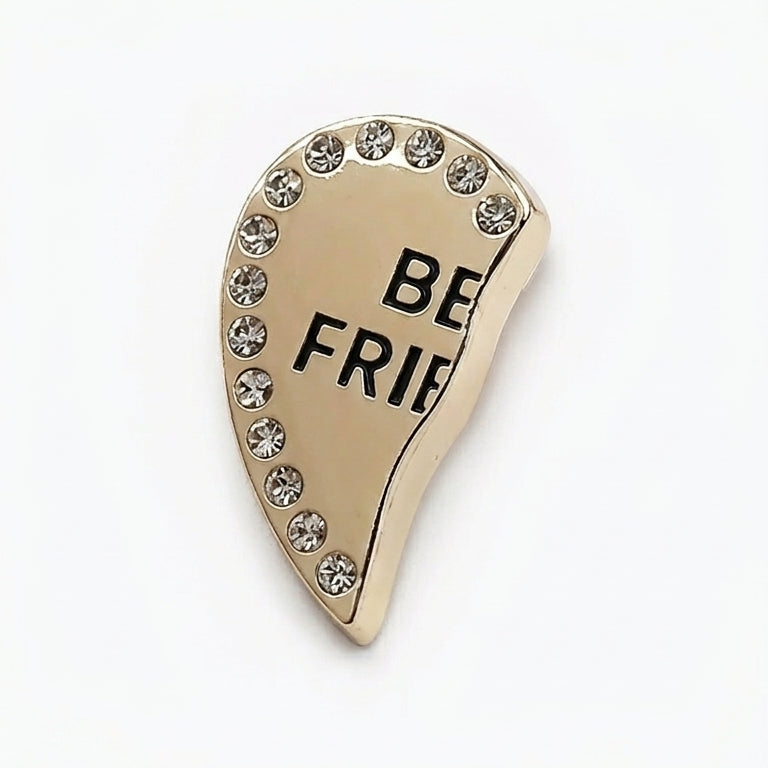 Gold charm with 'BE FRIEND' text and rhinestones on a white background