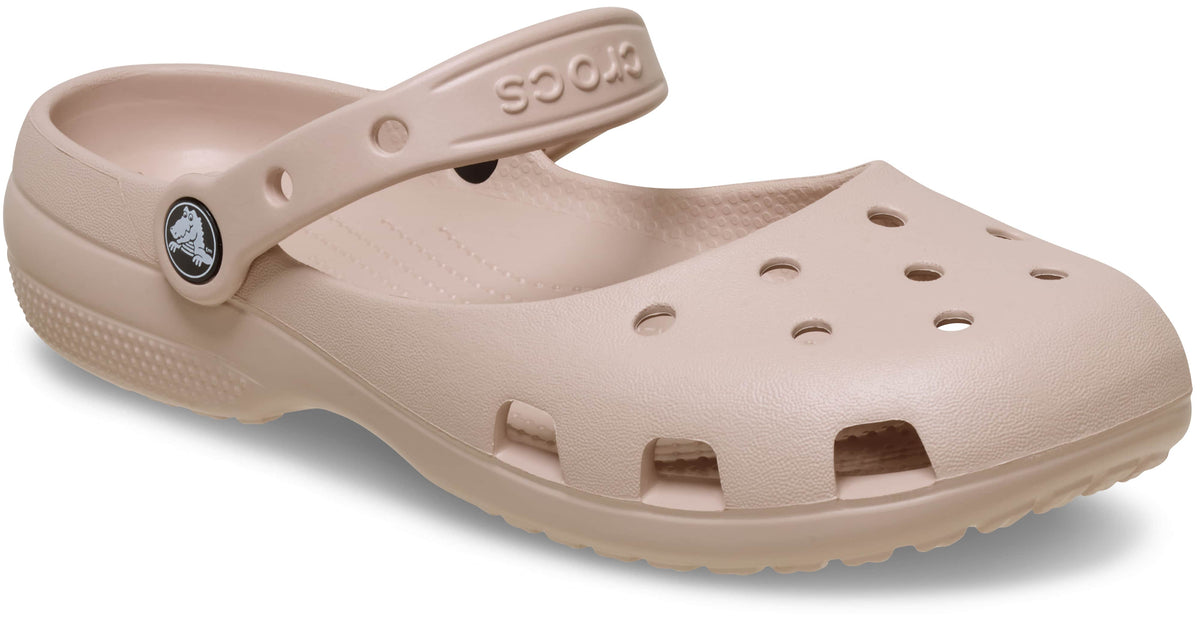 Beige clog shoe with 'Crocs' branding on a white background
