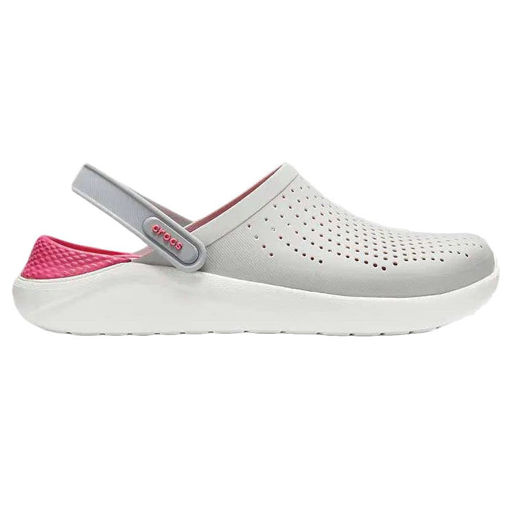 White and pink clog shoe on a light gray background