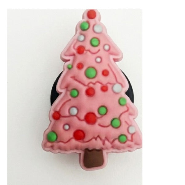 Pink Christmas tree-shaped object with red and green decorations on a white background