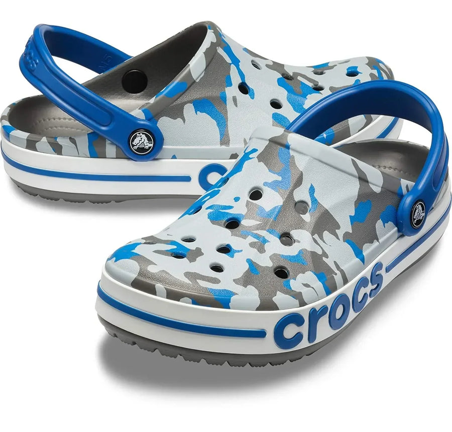 Blue, gray, and white camouflage slip-on clogs with ventilation holes and adjustable heel straps
